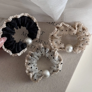 Three-piece set of mesh scrunchies with black polka dots and decorative white pearls