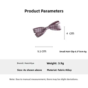 Detail showing dimensions of purple plaid bow hair clip in fabric and alloy material