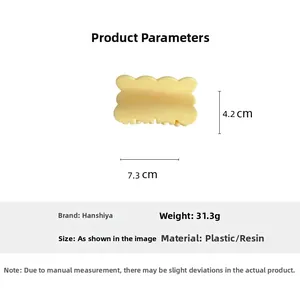 Détails de la pince à cheveux jaune style fromage avec dimensions de 7,3cm x 4,2cm