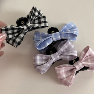 Set of four sweet plaid bow hair clips in black, blue, purple, and pink checkered fabric