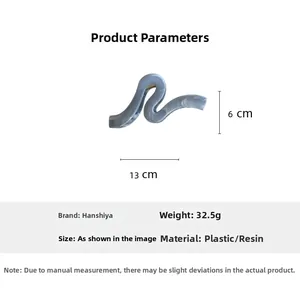 Blue-grey marble textured shark hair claw clip showing 13cm length size and weight specs