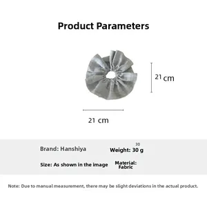 Detail of grey plaid fabric scrunchie showing 21cm diameter and soft texture