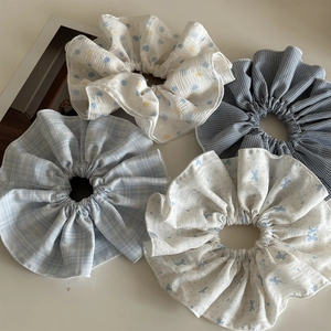 Set of four large hair scrunchies with blue and white polka dot and plaid patterns