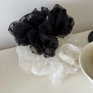 Set of two textured dot mesh scrunchies in classic black and white sheer organza