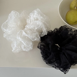 Black and white bubble gauze hair scrunchies with 3D polka dot texture in a pair