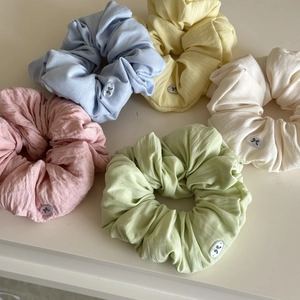Five macaron color puff fabric scrunchies set with minimalist bow logo emblems