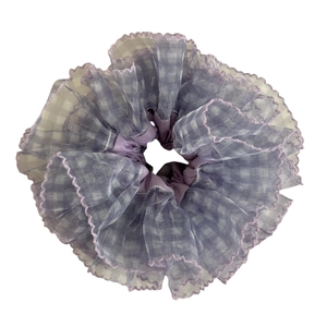 Elegant lavender mesh scrunchie with layered fabric and delicate wavy ruffled edges