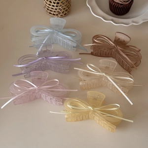 Set of six colorful ballet style ribbon bow claw clips in pastel resin for women