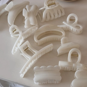 Creamy white jelly gloss hair claw clips set with elegant minimalist pearlescent finish