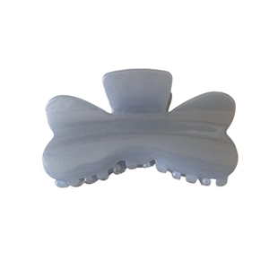 Elegant translucent light blue jelly hair claw clip with subtle glitter finish