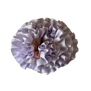Handmade pleated carnation hair scrunchie in lavender purple and brown tones on white backdrop