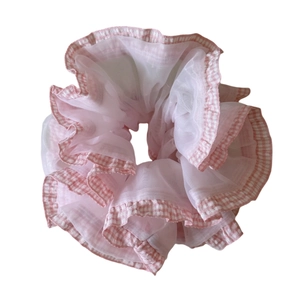 Pink checkered lace mesh hair scrunchie with layered design and elastic hold on white background