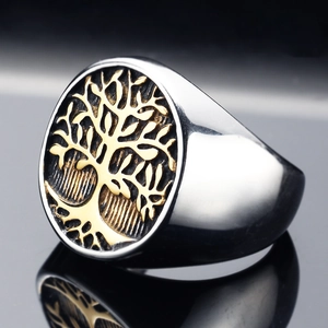 Polished stainless steel signet ring for men featuring a golden tree of life relief