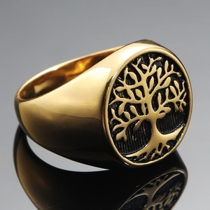Men's golden stainless steel signet ring featuring a black Tree of Life relief design