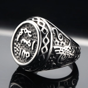 Retro stainless steel men's ring with oval engraved symbol and Celtic knot texture