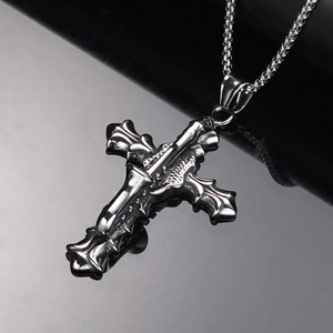 Retro gothic stainless steel cross necklace with polished box chain on reflective black background