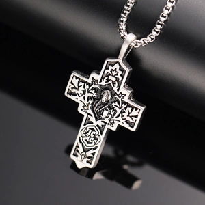 Vintage stainless steel cross necklace with religious relief carving on black mirror