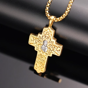 Vintage stainless steel cross necklace with gold and silver dual-tone religious engraving