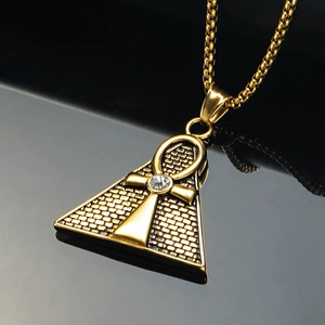 Hip hop style gold pyramid Ankh pendant necklace with sparkling crystal and textured finish