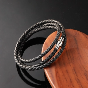 Three-layer braided black leather wrap bracelet with silver magnetic sphere clasp