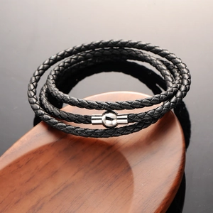 Triple-wrap black braided leather bracelet with a silver magnetic spherical clasp