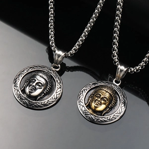 Pendentifs bouddhistes tête de Bouddha en argent vintage et finitions bicolores dorées