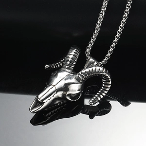 Vintage punk goat skull pendant in polished stainless steel with classic box chain