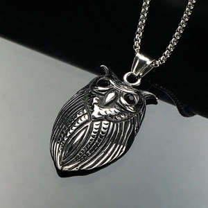 Vintage stainless steel owl pendant necklace with black gemstone eyes on silver chain