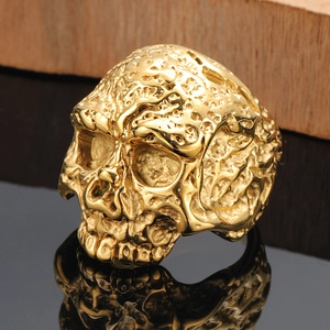 Vintage gold skull ring for men in punk hip-hop style with rugged lava texture finish