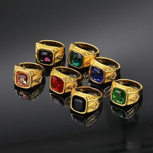 Set of seven gold titanium Masonic rings featuring various vibrant square-cut gemstones