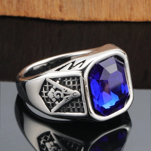 Men's silver steel signet ring with rectangular blue sapphire and Freemasonry side detail
