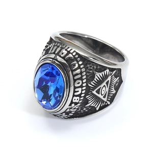 Vintage stainless steel ring with oval blue gemstone and Masonic Eye of Providence design