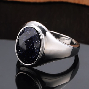 Polished silver titanium steel signet ring with oval faceted blue sand stone inlay