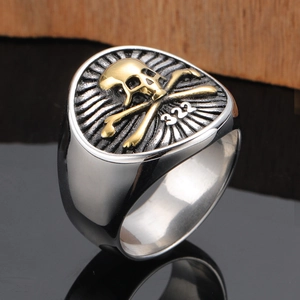 Punk style stainless steel men's ring with golden skull and crossbones emblem