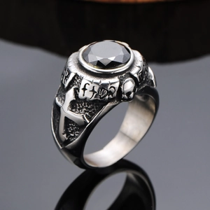 Vintage punk skull cross ring with large black gemstone in retro stainless steel