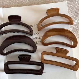 Set of semi-circle and rectangular wood texture hair claws in deep and light brown tones