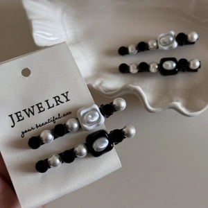 French vintage hair clip set with white pearls and black beads in retro elegant style