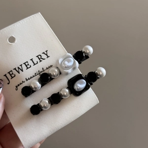 French vintage pearl hair clip set with black resin geometric beads in elegant design