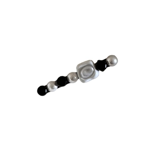 French vintage pearl hair clip with black and silver beads in a minimalist hair design