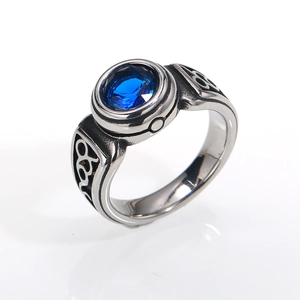 Vintage mens titanium steel ring with round blue gemstone and side floral carvings