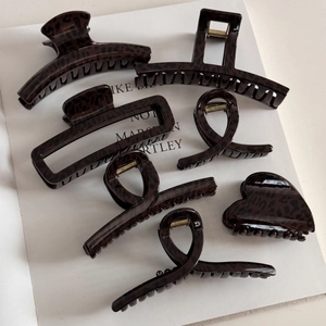 Brown leopard print hair claw clip set for women with various geometric resin shapes