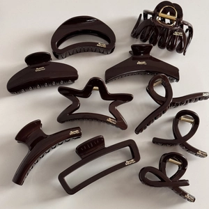 Chocolate brown hair claw clips set in various geometric shapes with gold metal springs
