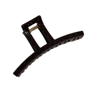 Elegant leopard print rectangular hair claw clip with golden spring on white background