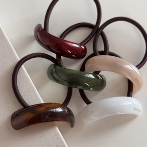 Elegant geometric resin hair ties set with elastic rope and gold lettering detail