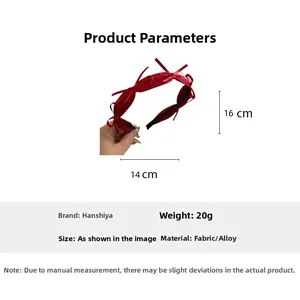 Detailed view of red bow headband with 14cm x 16cm dimensions and 20g weight data