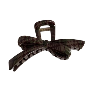 Dark red and green plaid bow hair claw clip in elegant Scottish tartan pattern