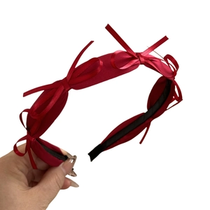 Elegant deep red satin bow headband with French style aesthetic and non-slip lining