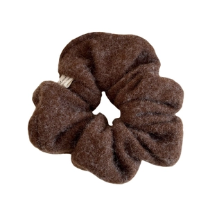 Brown fuzzy plush scrunchie made of wool-like fabric for autumn and winter hairstyles
