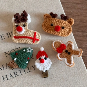 Handmade crochet Christmas hair clips set with reindeer tree and santa claus shapes