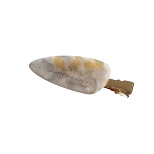 French minimalist acetate hair clip with cream marble texture and golden duckbill grip